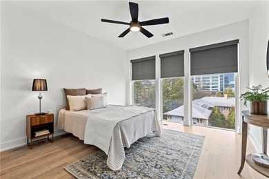 Better than new, this top-floor Midtown residence impresses with