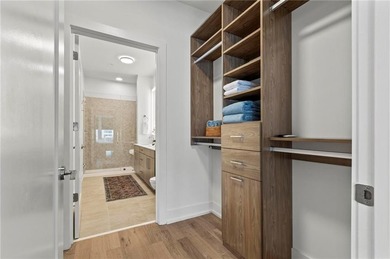 Better than new, this top-floor Midtown residence impresses with