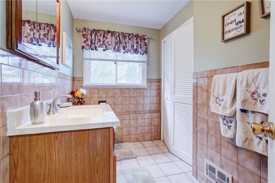 Welcome to this well-maintained split level home in Gates. Lots - photo 16