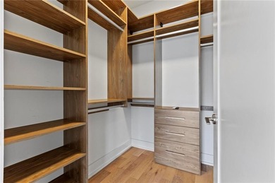 Better than new, this top-floor Midtown residence impresses with