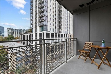 Better than new, this top-floor Midtown residence impresses with
