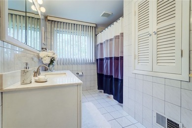 Welcome to this well-maintained split level home in Gates. Lots - photo 20