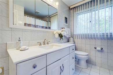 Welcome to this well-maintained split level home in Gates. Lots - photo 21