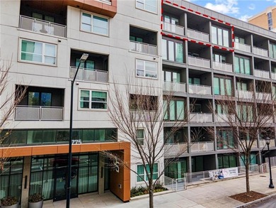 Better than new, this top-floor Midtown residence impresses with