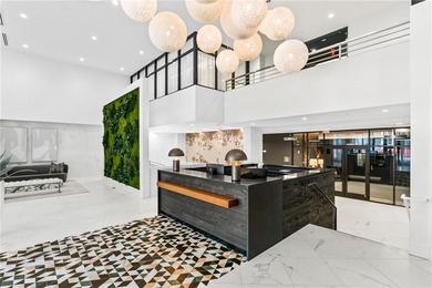Better than new, this top-floor Midtown residence impresses with