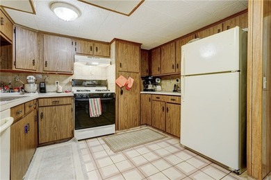 Welcome to this well-maintained split level home in Gates. Lots - photo 28