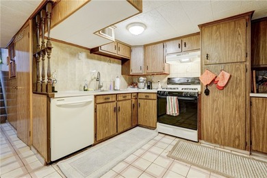 Welcome to this well-maintained split level home in Gates. Lots - photo 29