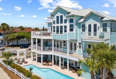 Beautifully furnished luxury home features 15-foot ceilings in - photo 2
