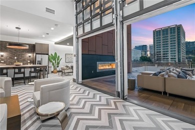 Better than new, this top-floor Midtown residence impresses with