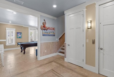 Beautifully furnished luxury home features 15-foot ceilings in - photo 8