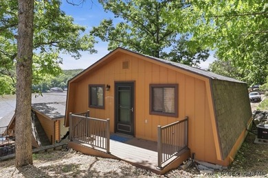 Discover a revitalized lakefront getaway situated at the 61.5 - photo 25