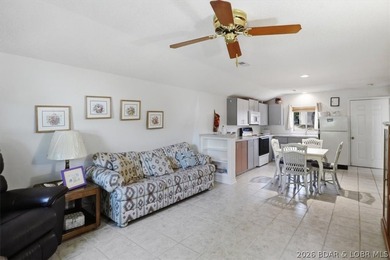 Discover a revitalized lakefront getaway situated at the 61.5 - photo 26