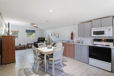 Discover a revitalized lakefront getaway situated at the 61.5 - photo 28
