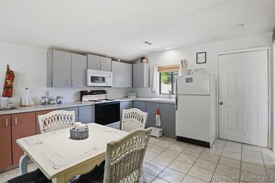 Discover a revitalized lakefront getaway situated at the 61.5 - photo 29