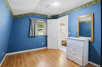 Discover a revitalized lakefront getaway situated at the 61.5 - photo 33
