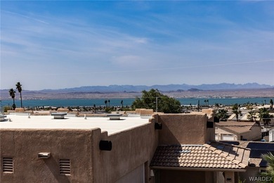 Check out the incredible lake views from the kitchen and dining - photo 40