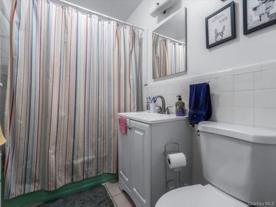 Large Brick 2-family in Pelham Bay. 2BR/1BA over 2BR/1BA over - photo 3