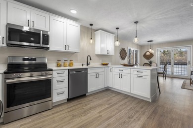 (private lake, pond, creek) Condo For Sale in Manchester New Hampshire