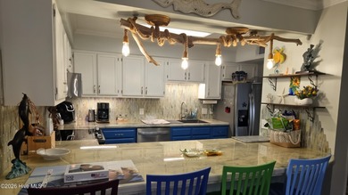 This beautiful two-bedroom, two-bath condo is located in Pine