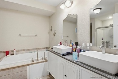 This stunning 4-bedroom, 3-bathroom lake home offers the perfect - photo 12