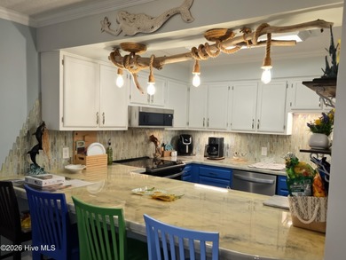 This beautiful two-bedroom, two-bath condo is located in Pine