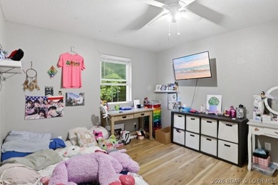 This stunning 4-bedroom, 3-bathroom lake home offers the perfect - photo 16