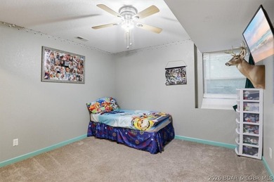 This stunning 4-bedroom, 3-bathroom lake home offers the perfect - photo 22