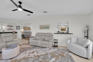 LAND OWNED 2/2 with rare 1 car garage! Nestled on a on a quiet - photo 12