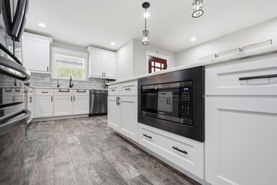 This beautifully updated home blends modern style with - photo 14