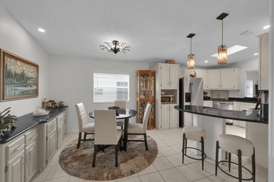 LAND OWNED 2/2 with rare 1 car garage! Nestled on a on a quiet - photo 14