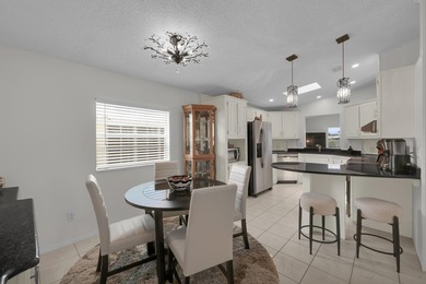 LAND OWNED 2/2 with rare 1 car garage! Nestled on a on a quiet - photo 15