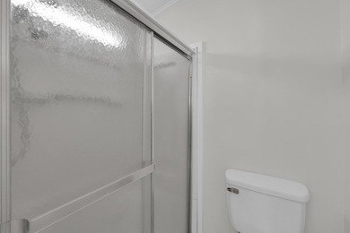 LAND OWNED 2/2 with rare 1 car garage! Nestled on a on a quiet - photo 27
