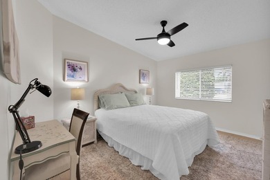 LAND OWNED 2/2 with rare 1 car garage! Nestled on a on a quiet - photo 28