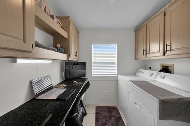 LAND OWNED 2/2 with rare 1 car garage! Nestled on a on a quiet - photo 33