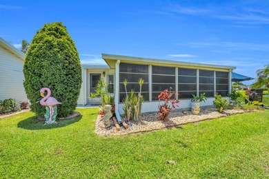 LAND OWNED 2/2 with rare 1 car garage! Nestled on a on a quiet - photo 41