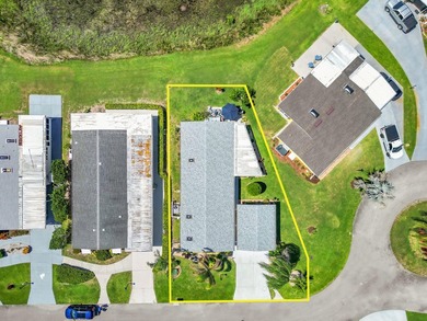 LAND OWNED 2/2 with rare 1 car garage! Nestled on a on a quiet - photo 46
