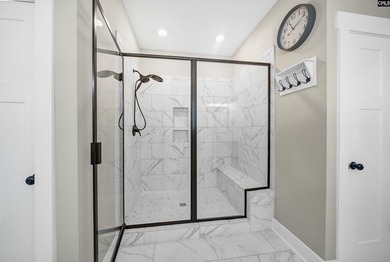 Stunning custom home with timeless charm! Welcome to this - photo 32