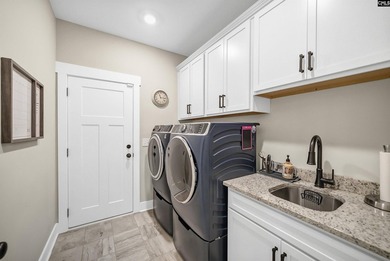 Stunning custom home with timeless charm! Welcome to this - photo 36