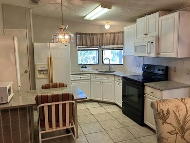 This nice home is perfect to downsize, home away from home or - photo 8