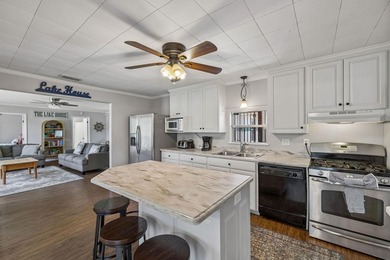 215' of shoreline. Wide yard. Meadow Lake living done right - photo 14