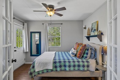215' of shoreline. Wide yard. Meadow Lake living done right - photo 17