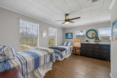 215' of shoreline. Wide yard. Meadow Lake living done right - photo 19