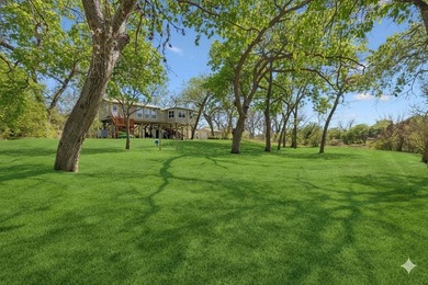 215' of shoreline. Wide yard. Meadow Lake living done right - photo 25