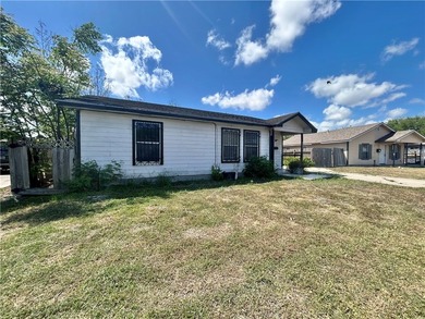 Opportunity awaits with this three-bedroom, two-bath home full - photo 3