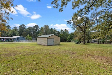 Three lots and a spacious 26x20 metal shop with three roll-up - photo 11