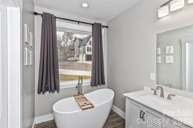 Nestled in the serene, gated community of Fox Lair Crossings and - photo 15