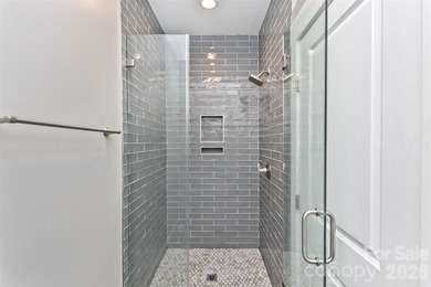 Nestled in the serene, gated community of Fox Lair Crossings and - photo 16