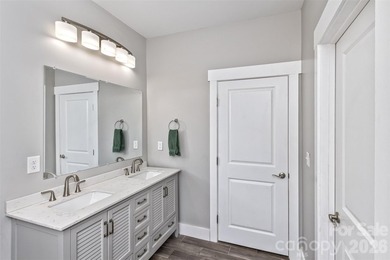 Nestled in the serene, gated community of Fox Lair Crossings and - photo 17