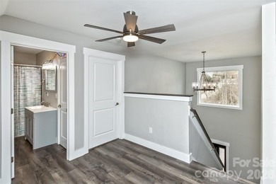 Nestled in the serene, gated community of Fox Lair Crossings and - photo 20