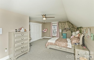 Nestled in the serene, gated community of Fox Lair Crossings and - photo 23